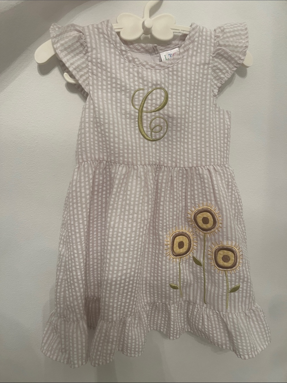 Monogrammed Initial “C” tan seersucker dress with embroidered yellow flowers